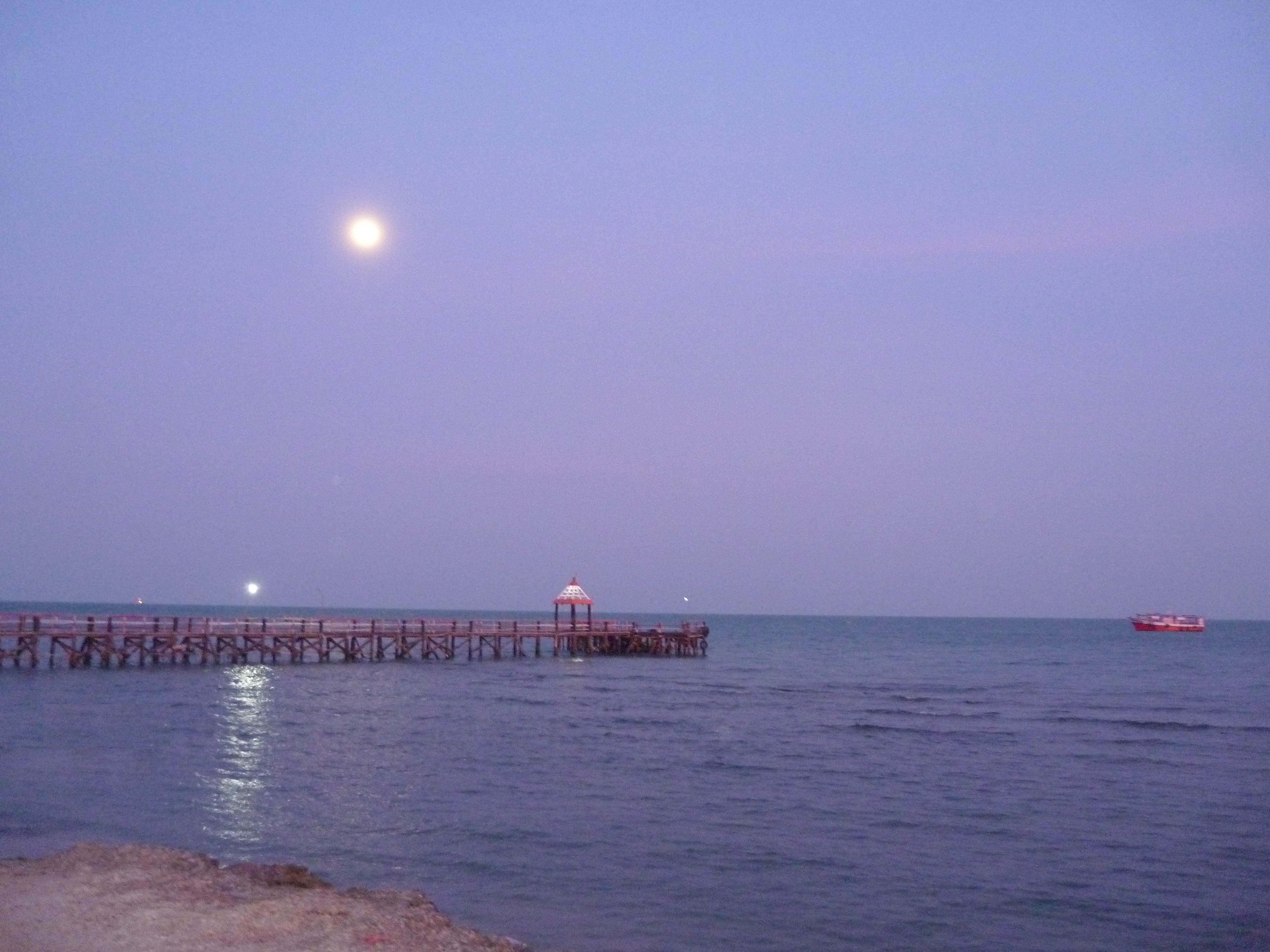 Full moon lit night sky as seen from the Agnitheertham boat jetty