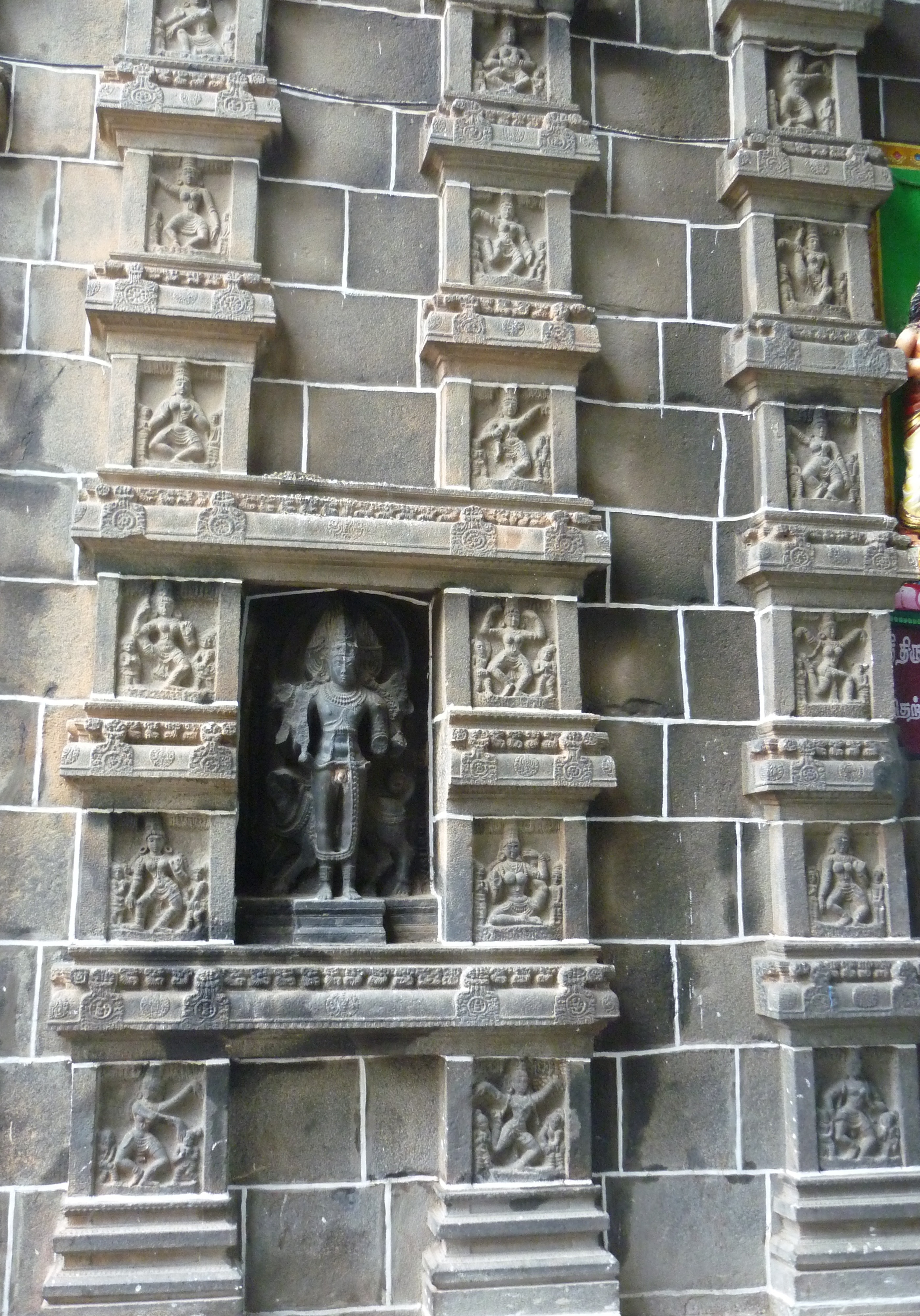 The Bharatanatyam postures sculpted on the walls of the west-tower of the temple