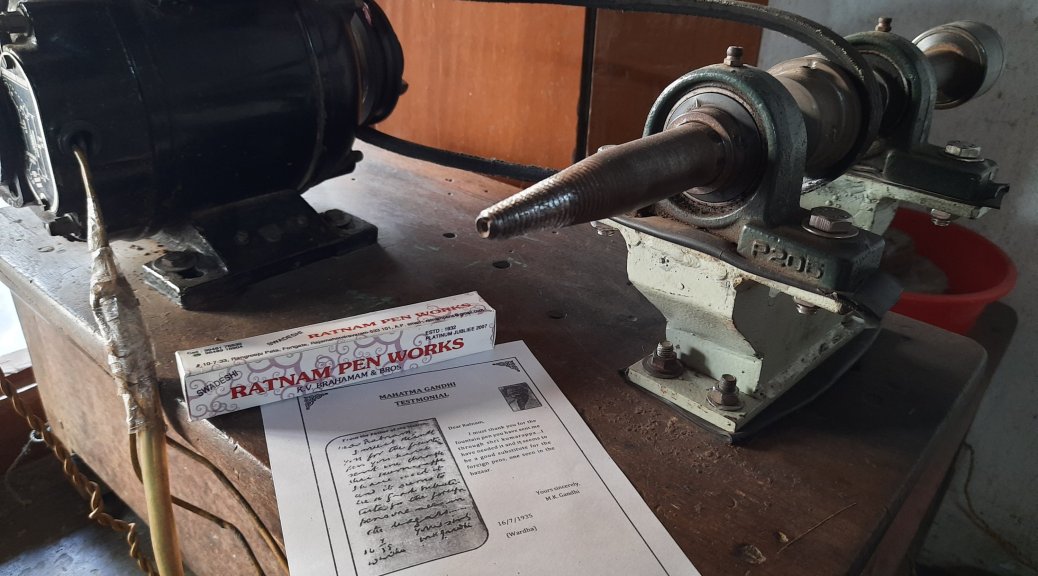 A copy of Gandhiji's letter, a fountain pen case and the lathe machine at Ratnam pens workshop