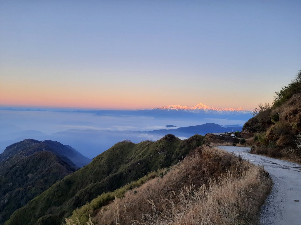 The sun rising over Kanchenjunga at Thambi view point